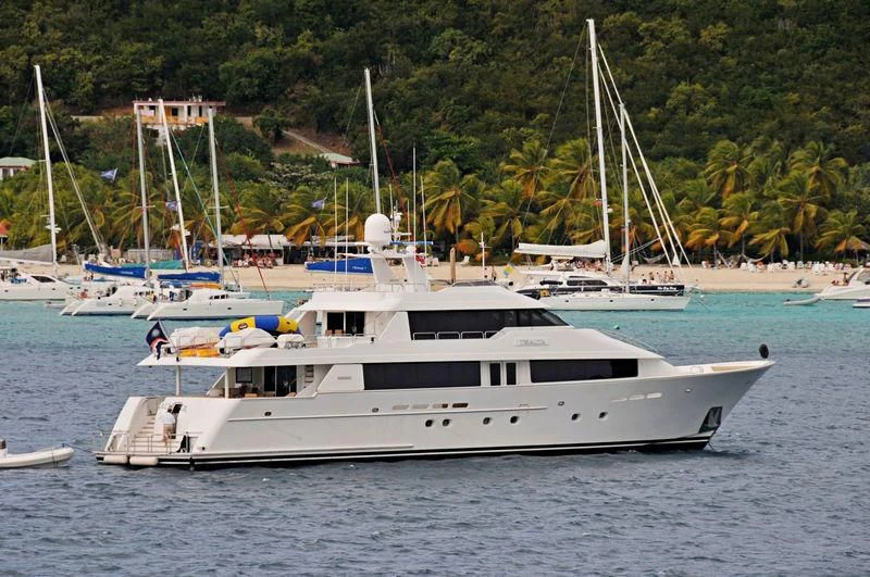 a white yacht in the water aboard TSALTA Yacht for Sale