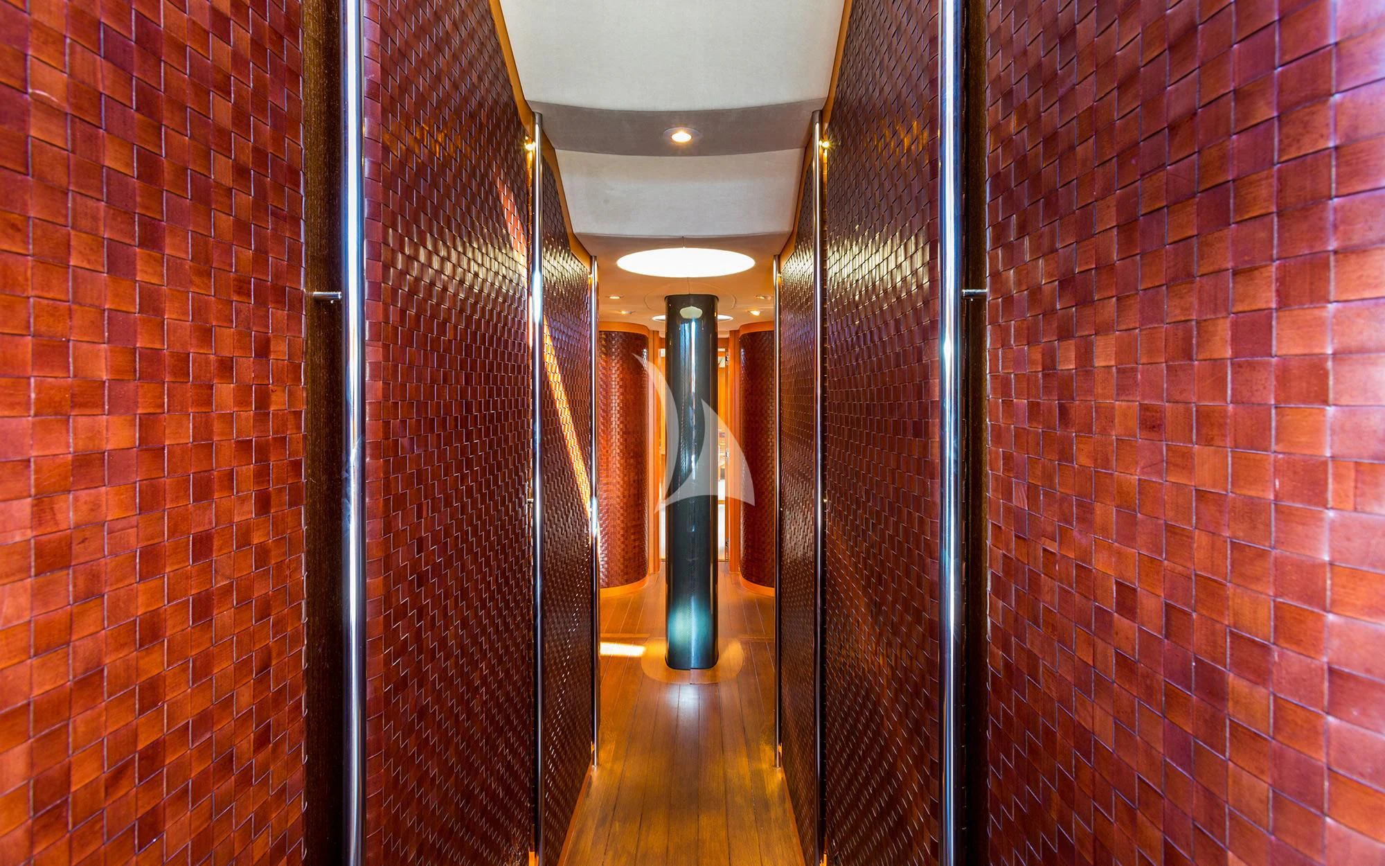 a person standing in a hallway aboard SWAGGER Yacht for Sale