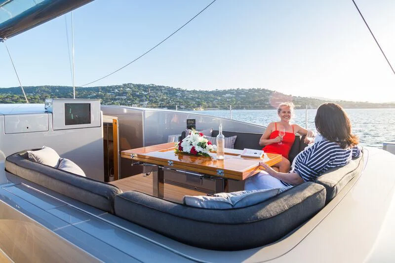 a couple sitting on a boat aboard SWAGGER Yacht for Sale