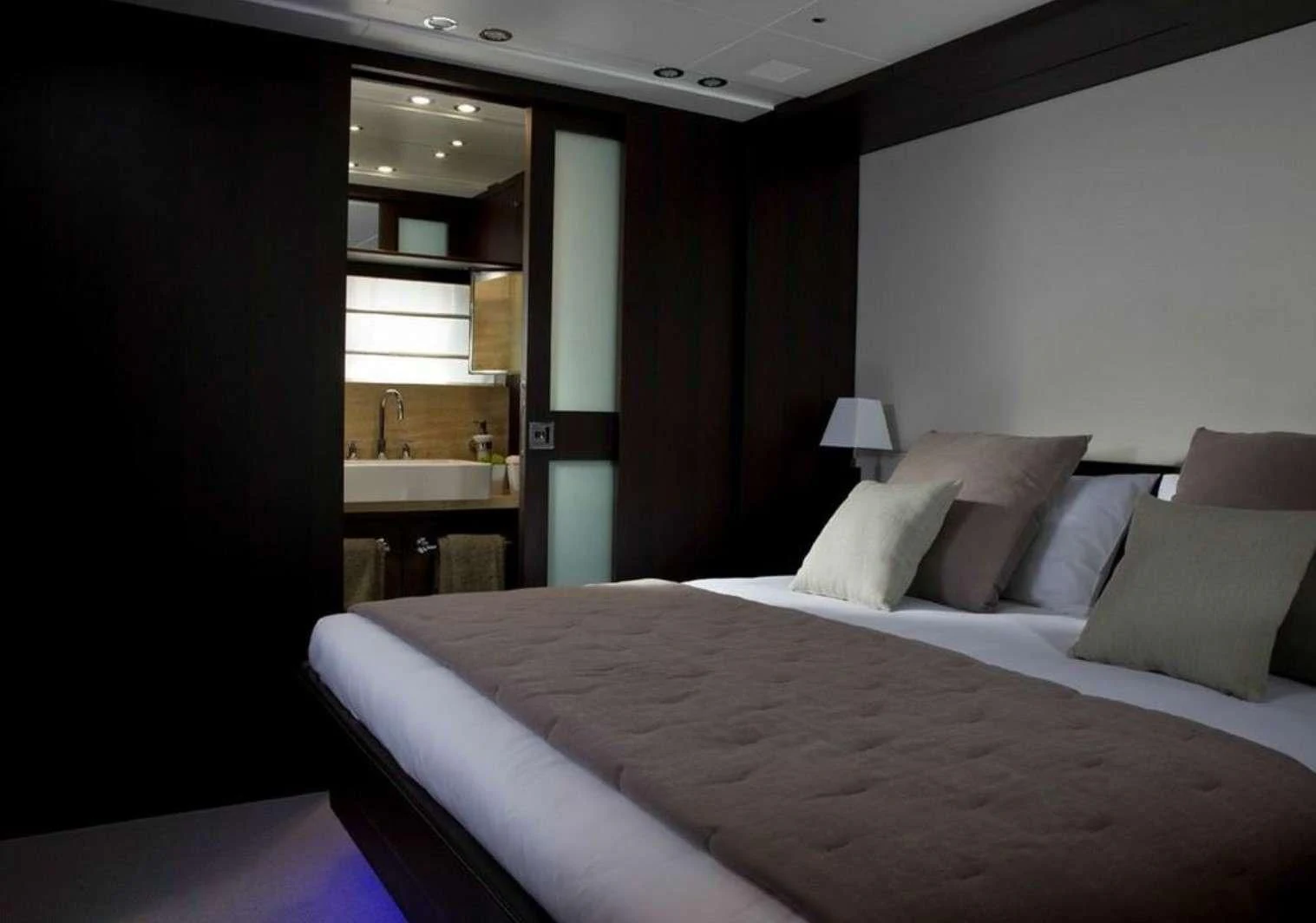 a bed in a room aboard MIRAVAL Yacht for Charter