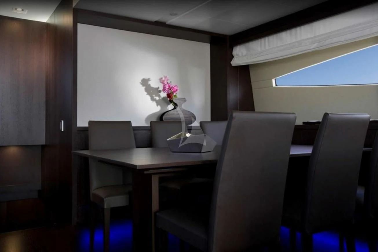 a room with a table and chairs aboard MIRAVAL Yacht for Charter