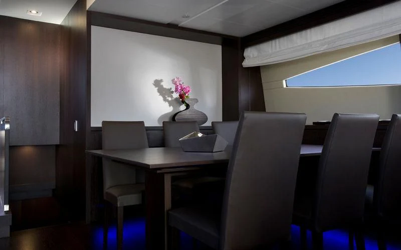 a room with a table and chairs aboard MIRAVAL Yacht for Charter