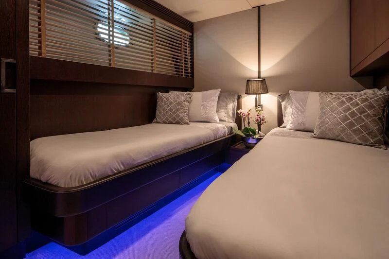 a room with two beds aboard MIRAVAL Yacht for Charter