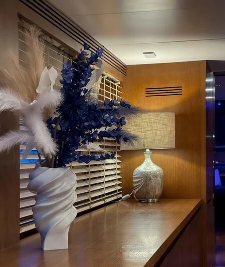 a vase of flowers aboard MIRAVAL Yacht for Charter