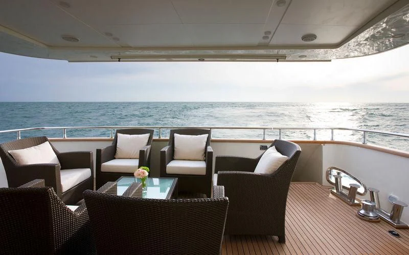 a room with a table and chairs aboard MIRAVAL Yacht for Charter