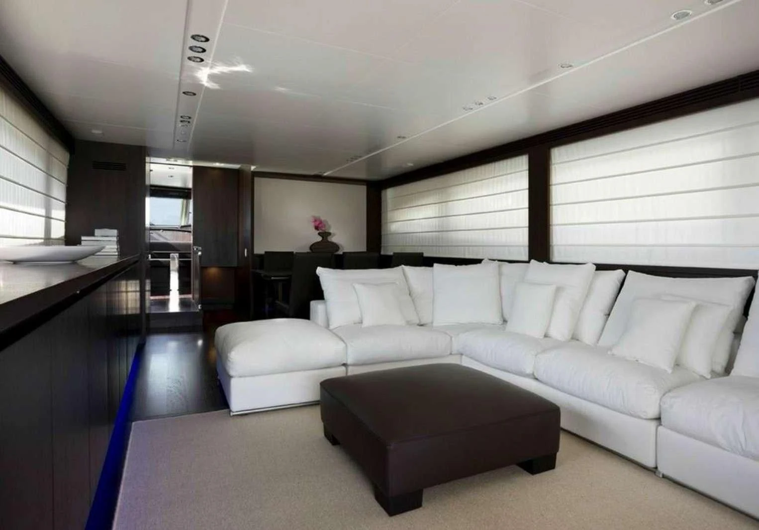 a living room with a couch and a table aboard MIRAVAL Yacht for Charter