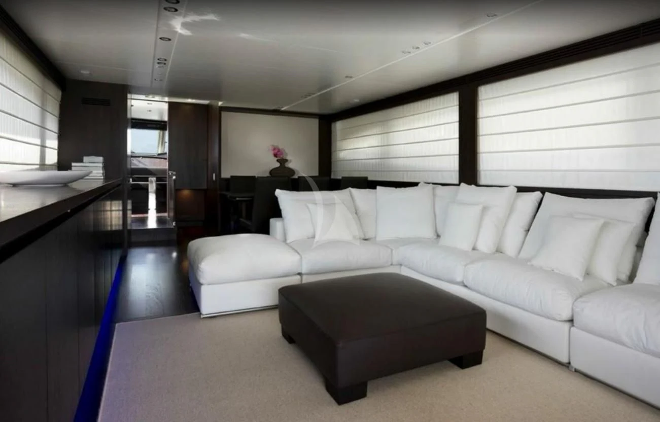 a living room with a couch and a table aboard MIRAVAL Yacht for Charter