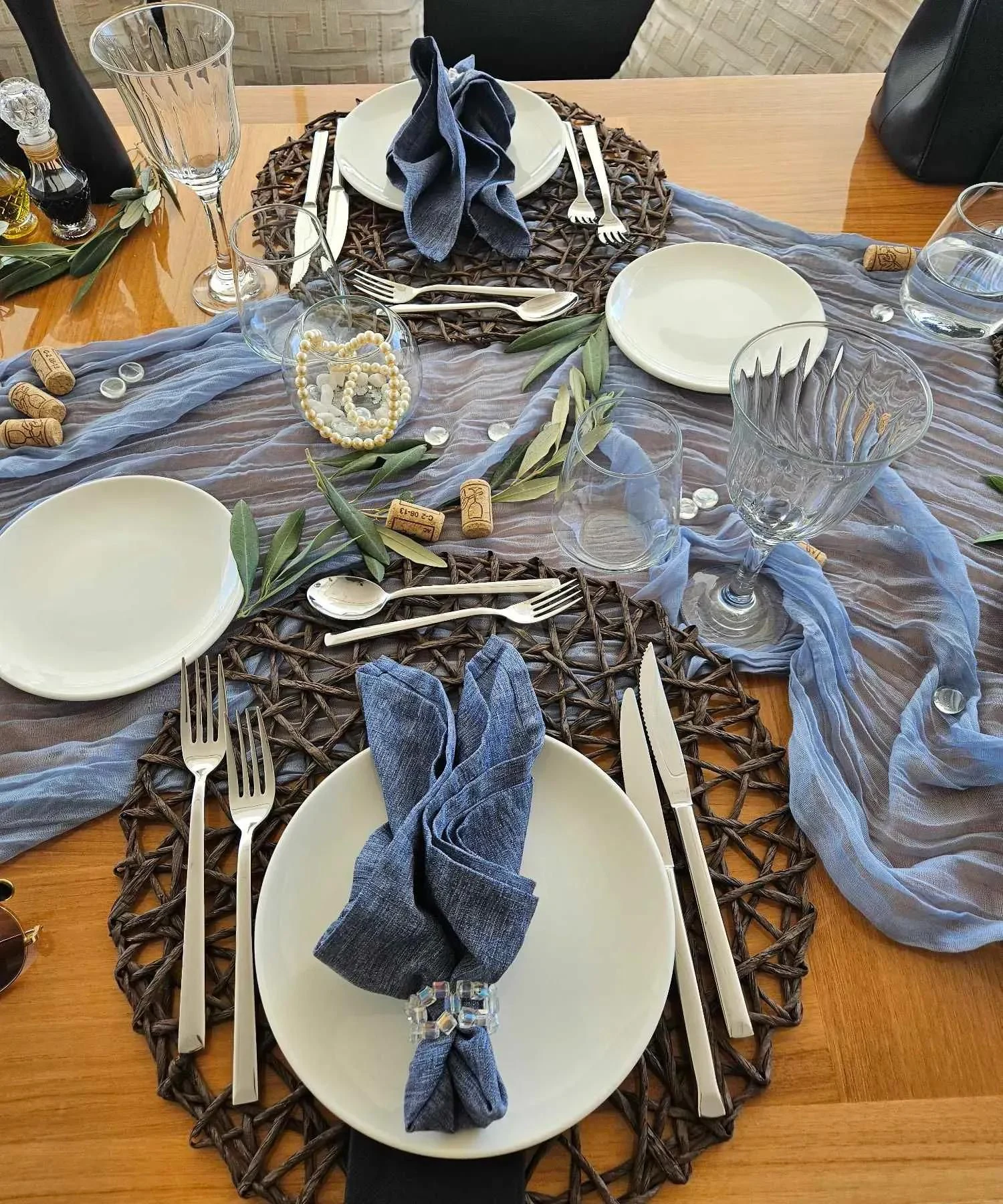 a table with plates and silverware aboard MIRAVAL Yacht for Charter