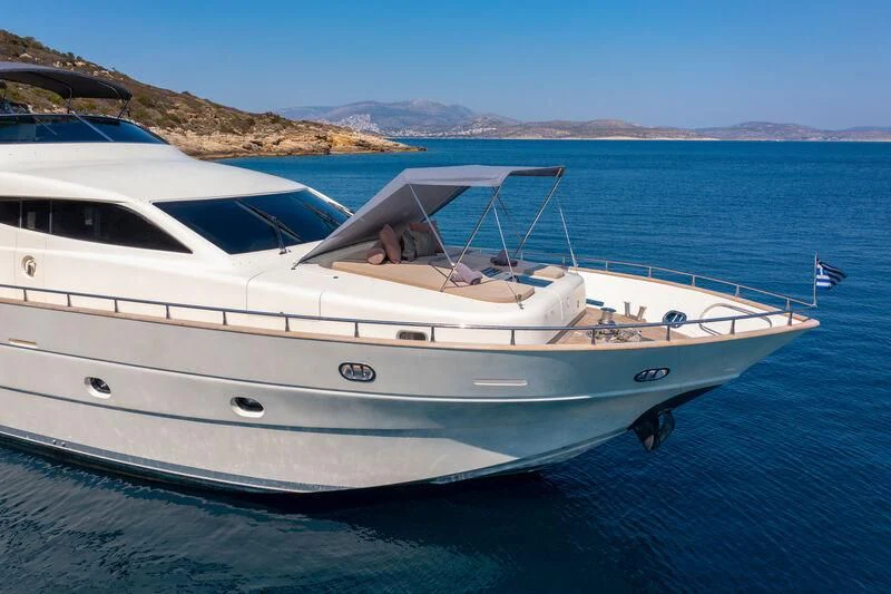 a white boat on the water aboard MIRAVAL Yacht for Charter
