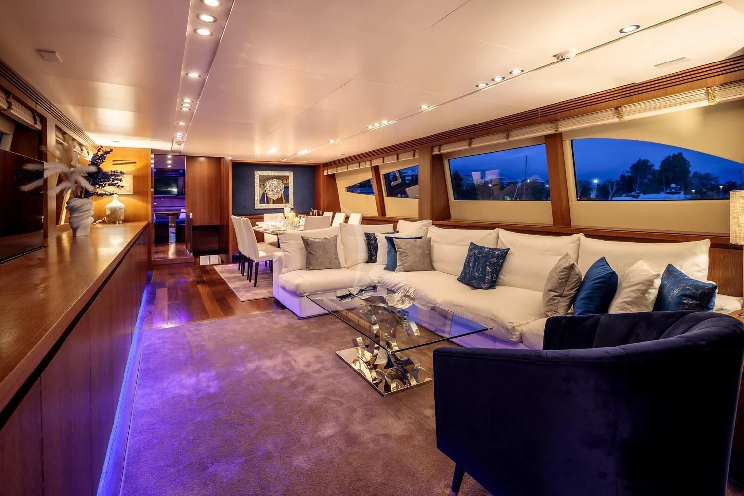 a living room with a large sofa aboard MIRAVAL Yacht for Charter