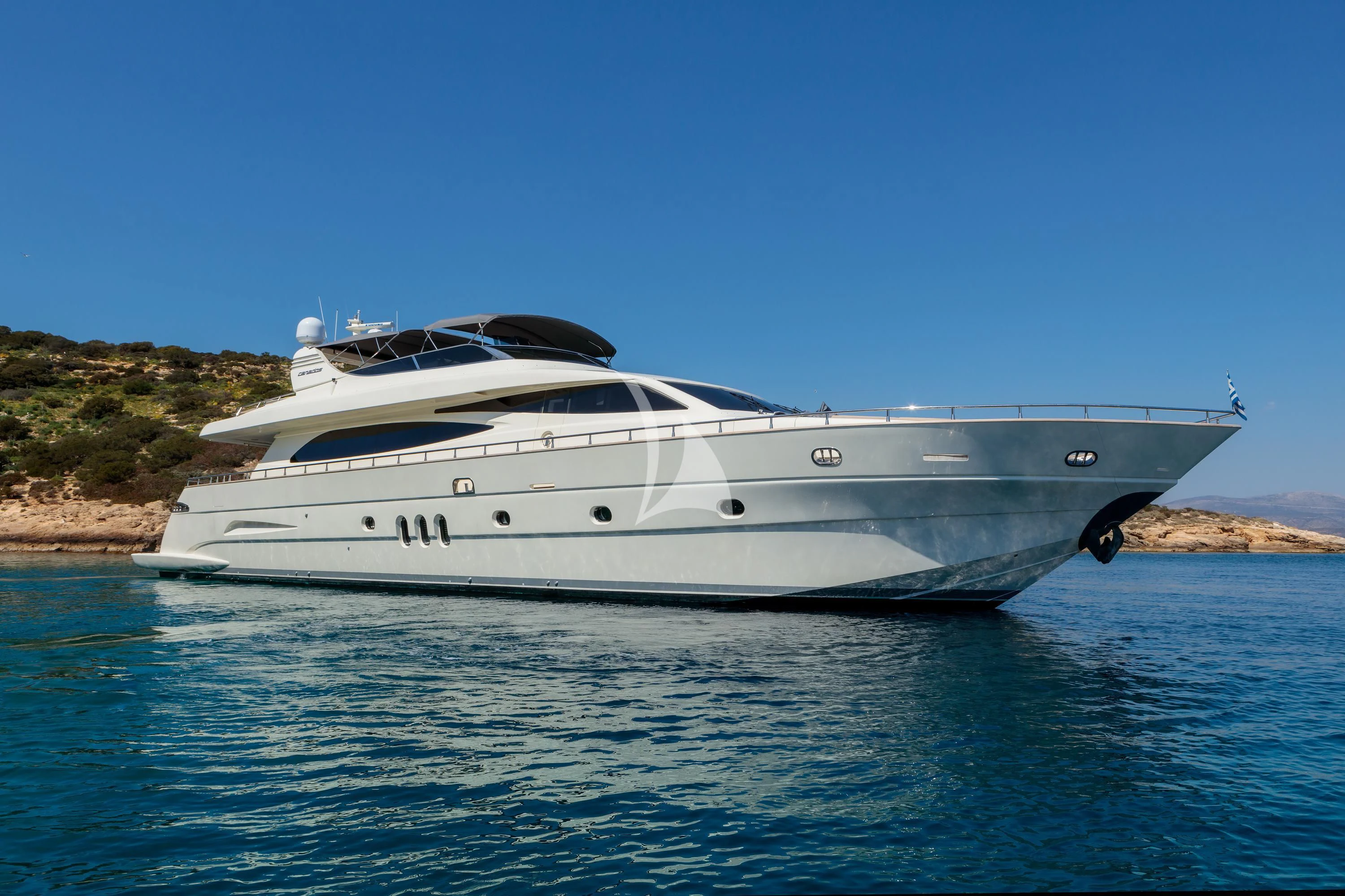 a white yacht on the water aboard MIRAVAL Yacht for Charter