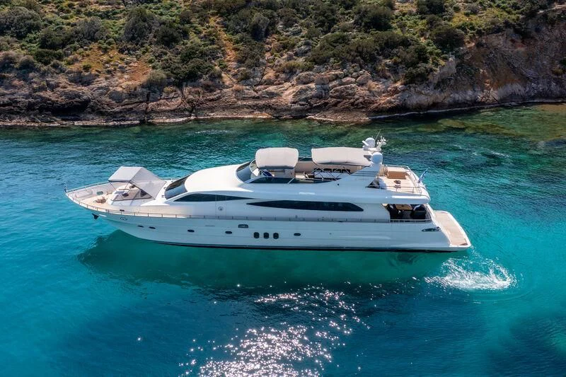 a white yacht in the water aboard MIRAVAL Yacht for Charter