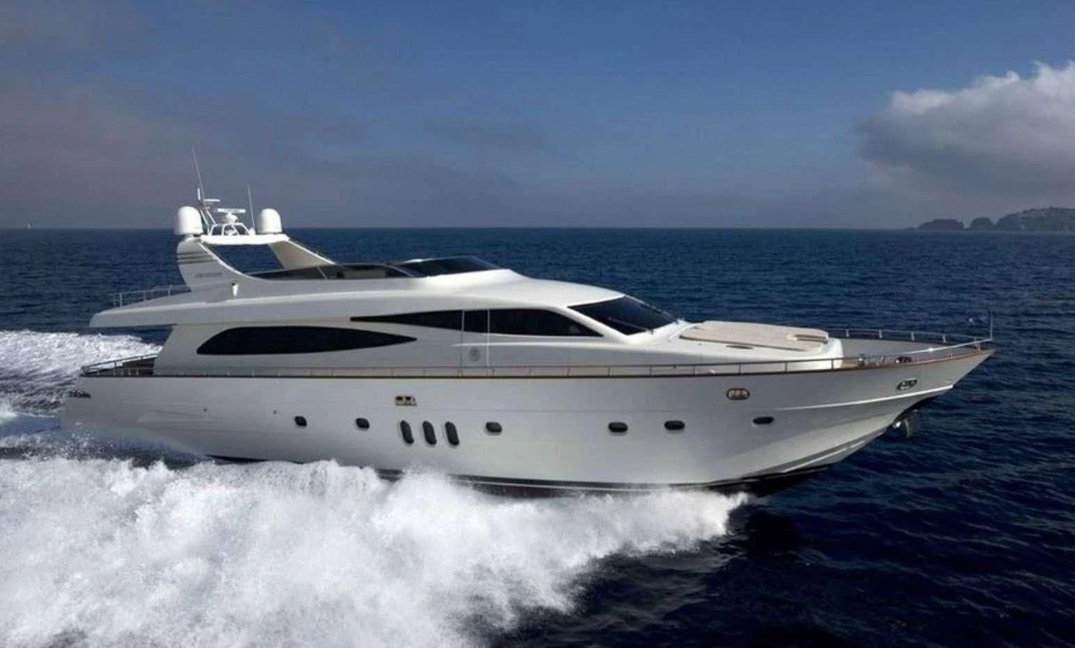 a white yacht on the water aboard MIRAVAL Yacht for Charter