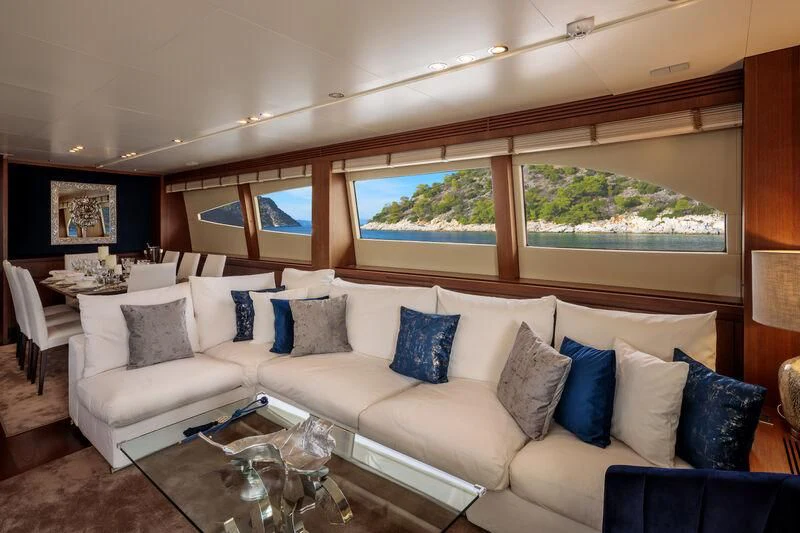 a living room with a large window aboard MIRAVAL Yacht for Charter