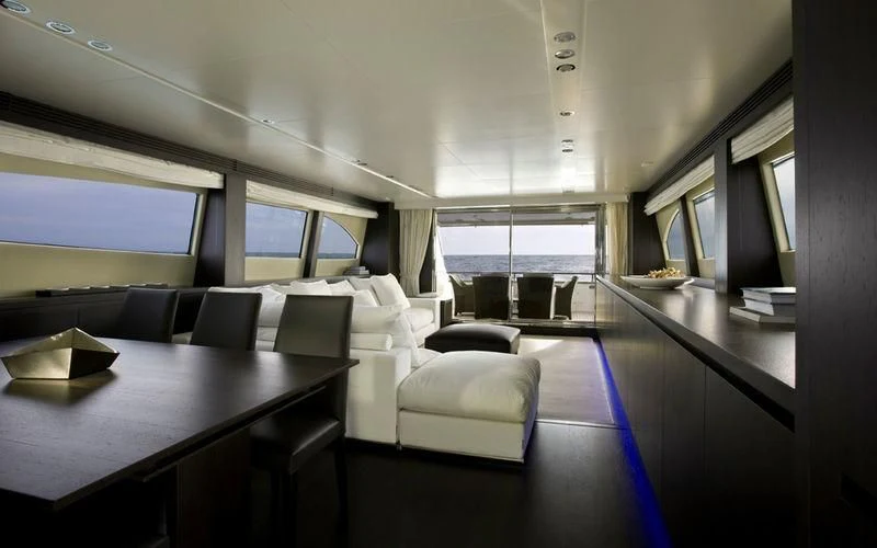 a room with a table and chairs aboard MIRAVAL Yacht for Charter