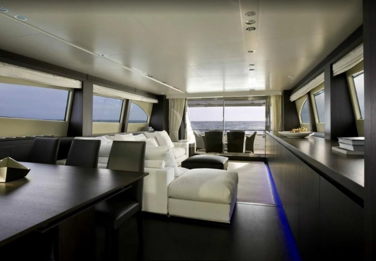 a room with a table and chairs aboard MIRAVAL Yacht for Charter