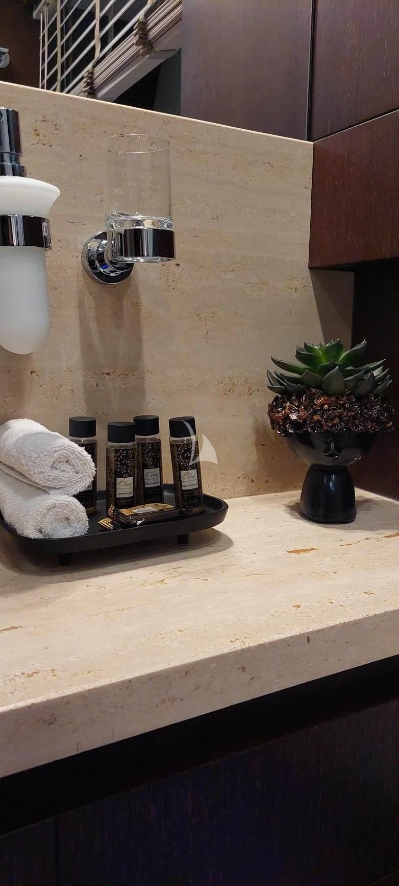 a counter top with a plant and a plant in a pot aboard MIRAVAL Yacht for Charter