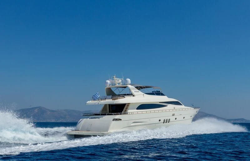 a white yacht on the water aboard MIRAVAL Yacht for Charter