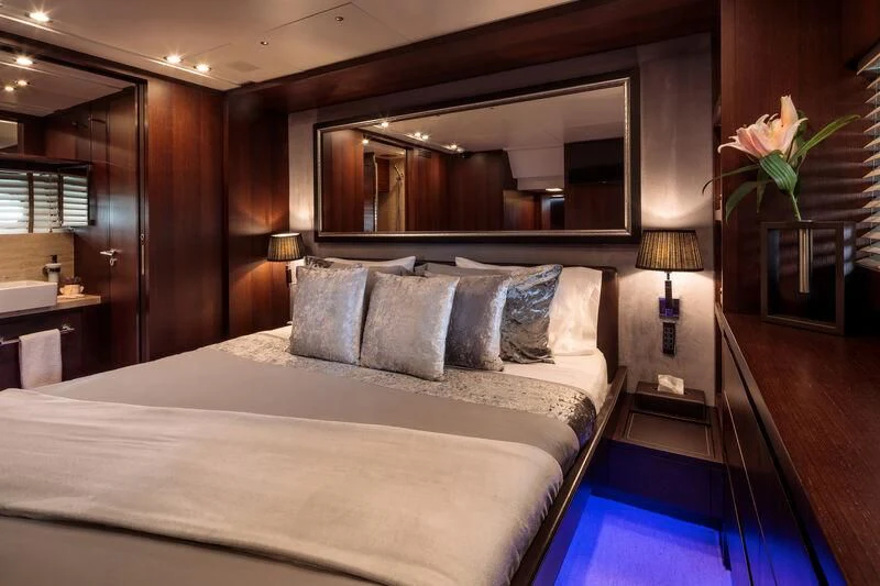 a bed in a room aboard MIRAVAL Yacht for Charter