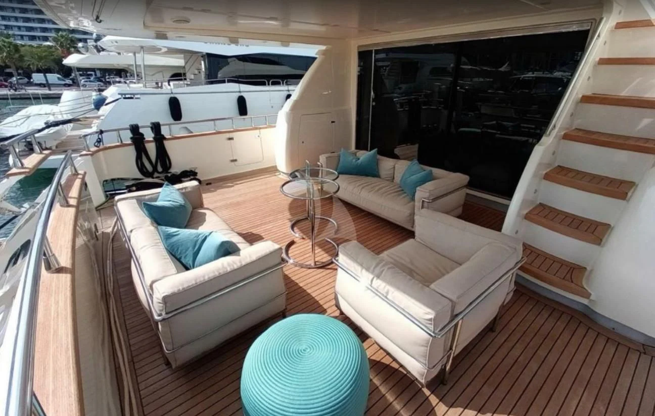 a living room with a couch and a table aboard MIRAVAL Yacht for Charter