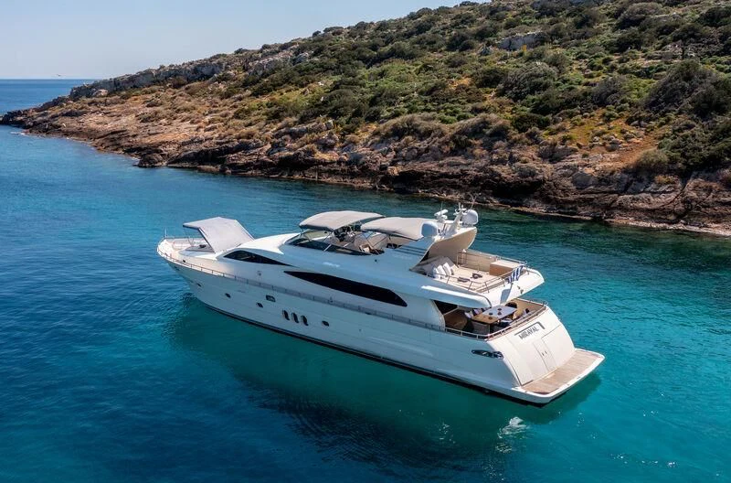 a white yacht in the water aboard MIRAVAL Yacht for Charter