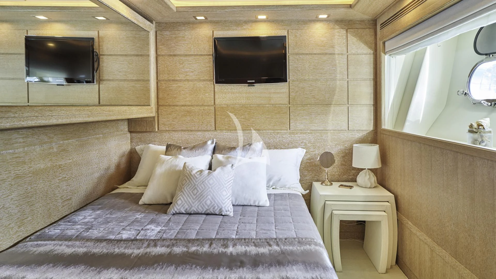 a bed with white pillows aboard ACCEPTUS Yacht for Sale