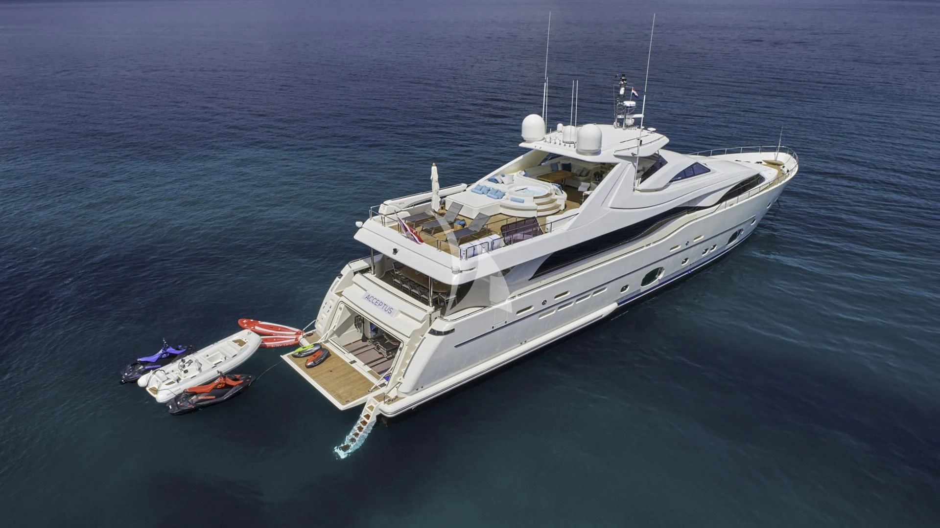 a large ship in the water aboard ACCEPTUS Yacht for Sale