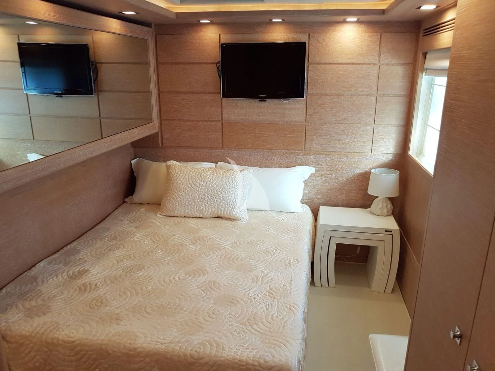 a hotel room with a bed aboard ACCEPTUS Yacht for Sale