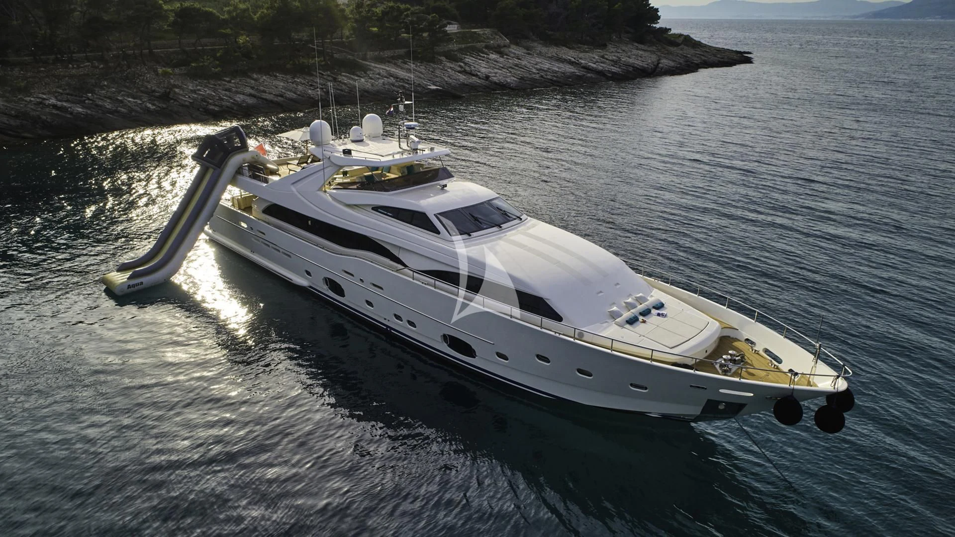a white boat in the water aboard ACCEPTUS Yacht for Sale