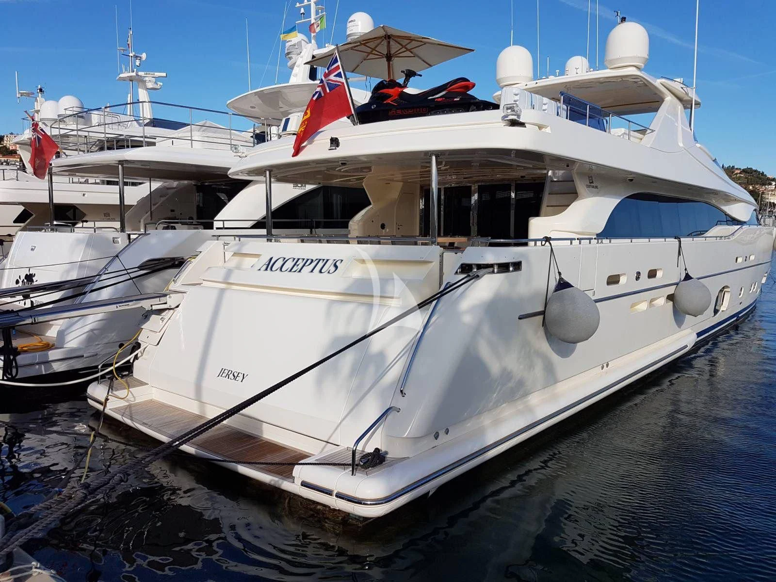 a white yacht in the water aboard ACCEPTUS Yacht for Sale