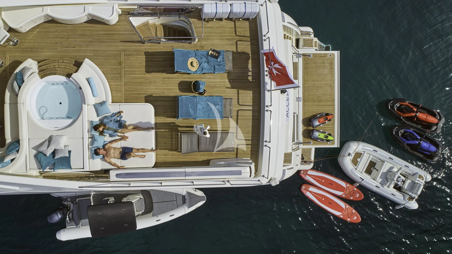 a boat with a deck and a deck and a deck aboard ACCEPTUS Yacht for Sale