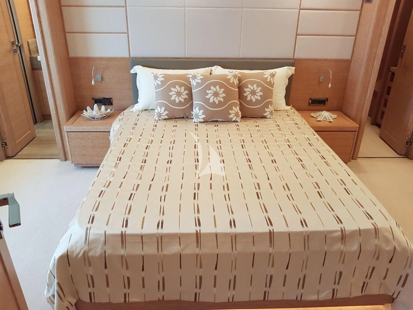 a bed with white sheets aboard ACCEPTUS Yacht for Sale
