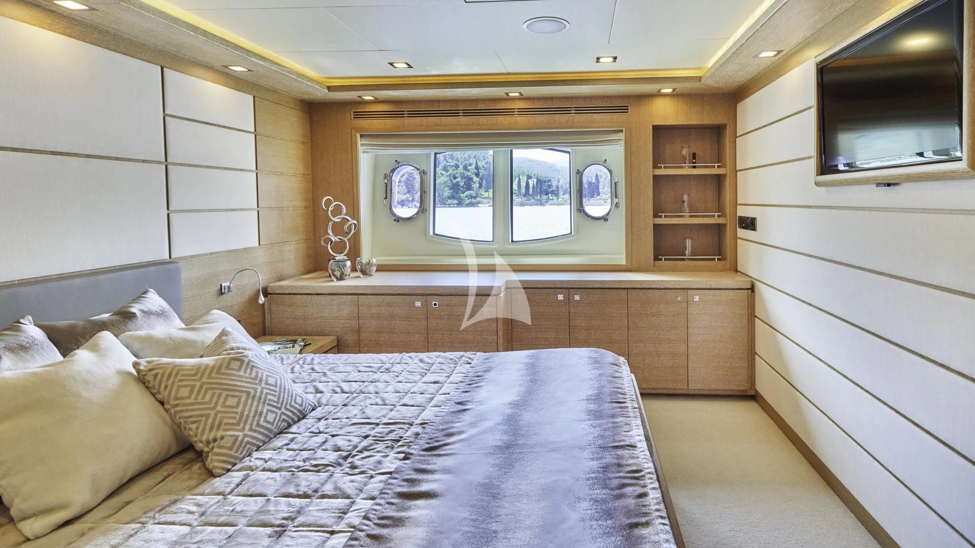 a bed in a room aboard ACCEPTUS Yacht for Sale
