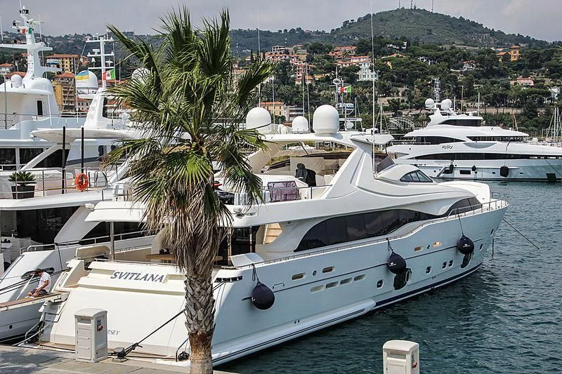 a white boat in the water aboard ACCEPTUS Yacht for Sale