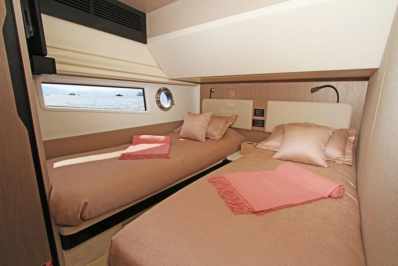 a room with two beds aboard IMAGINE Yacht for Sale