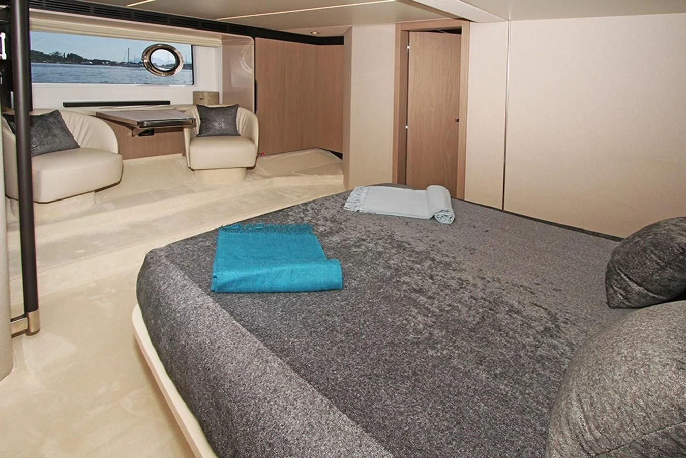 a large bed in a room aboard IMAGINE Yacht for Sale