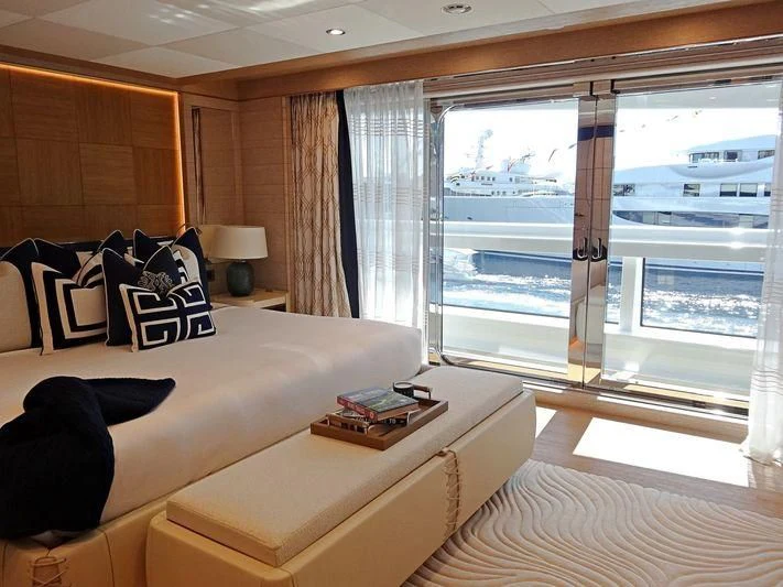 a living room with a large window aboard STARBURST IV Yacht for Charter