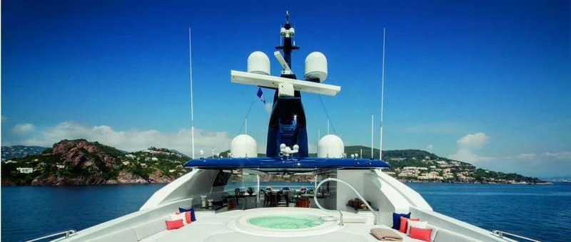 a boat with a satellite dish on it aboard STARBURST IV Yacht for Charter