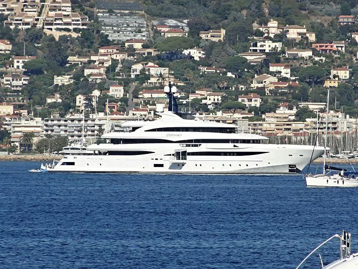 a large white boat in the water aboard STARBURST IV Yacht for Charter