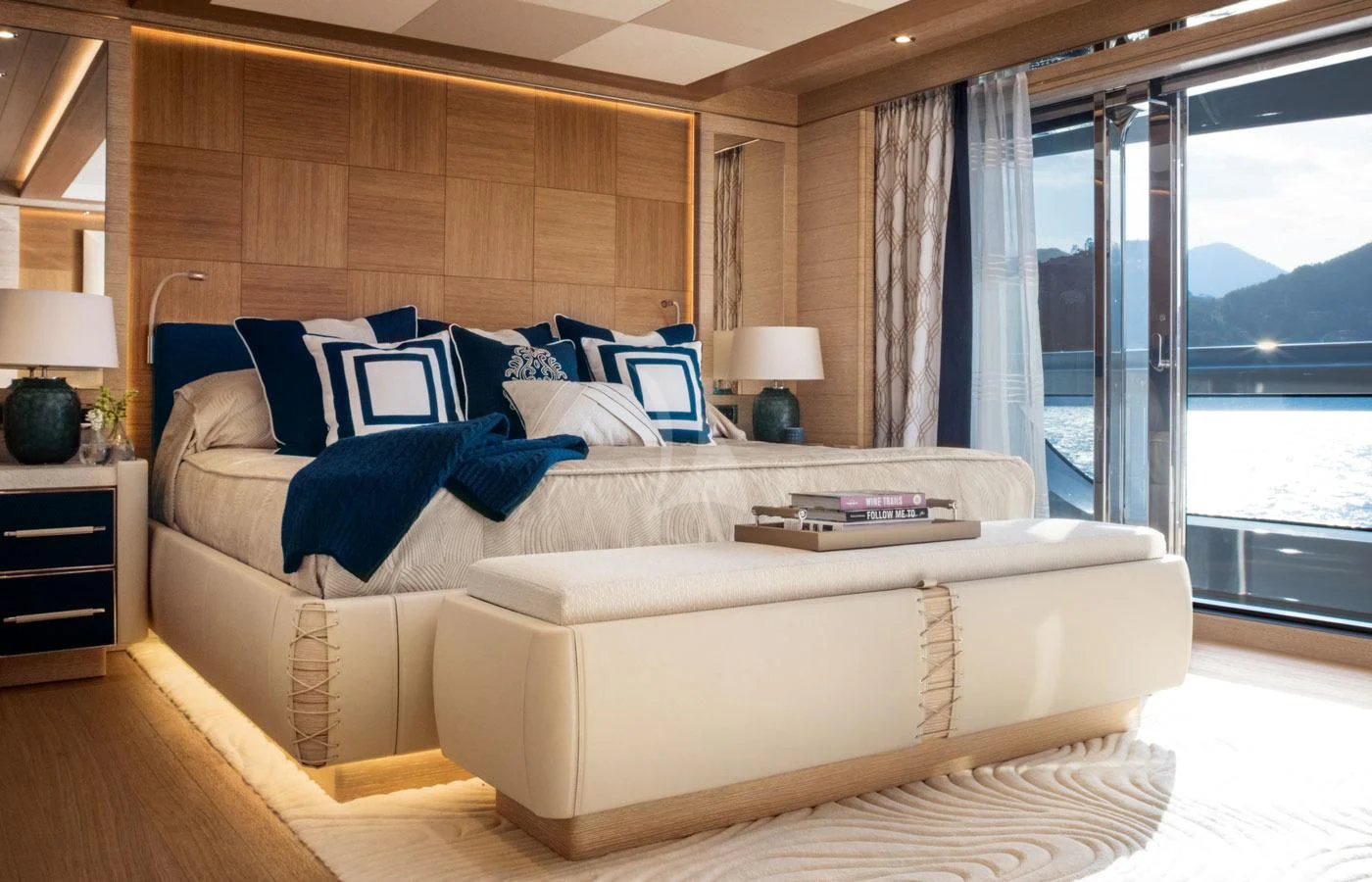 a large bed in a room aboard STARBURST IV Yacht for Charter