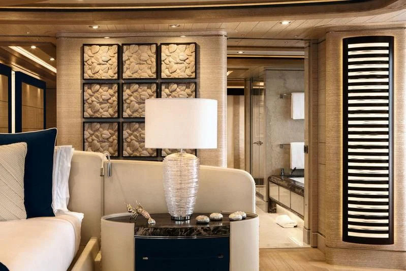 a room with a table and a lamp aboard STARBURST IV Yacht for Charter
