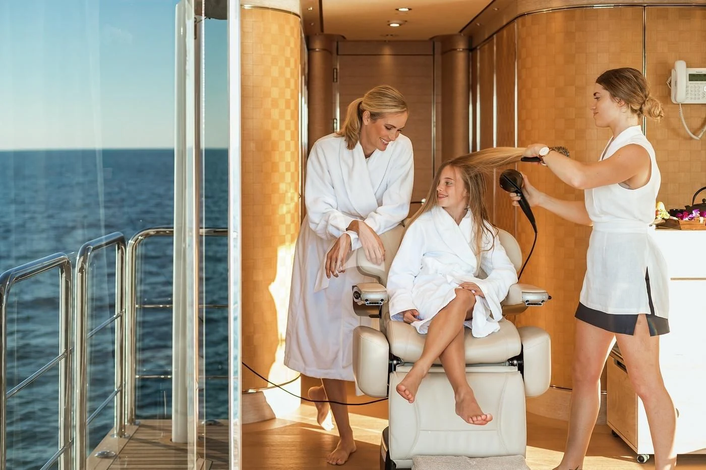 a group of women in a room aboard STARBURST IV Yacht for Charter
