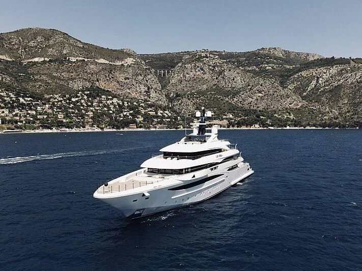 a white yacht in the water aboard STARBURST IV Yacht for Charter