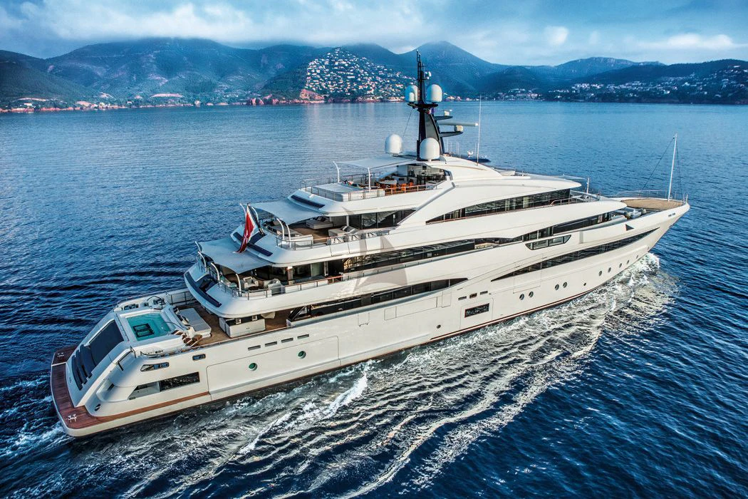 a large white ship in the water aboard STARBURST IV Yacht for Charter