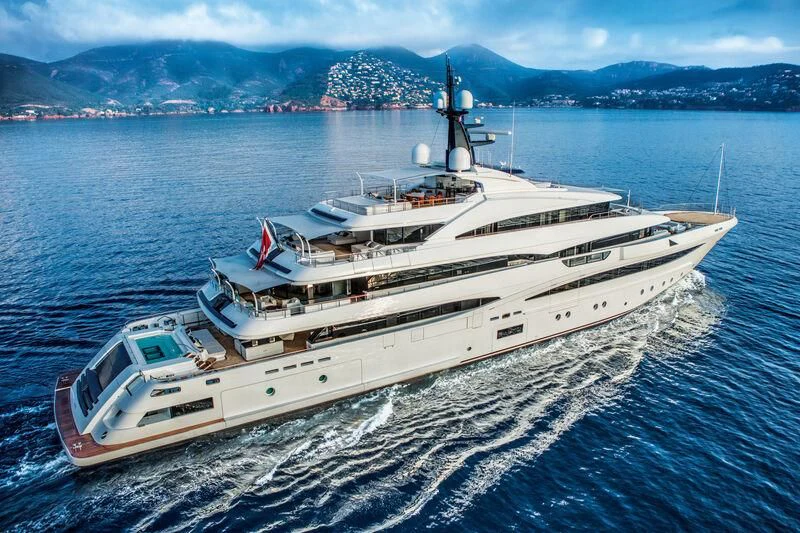 a large white ship in the water aboard STARBURST IV Yacht for Charter