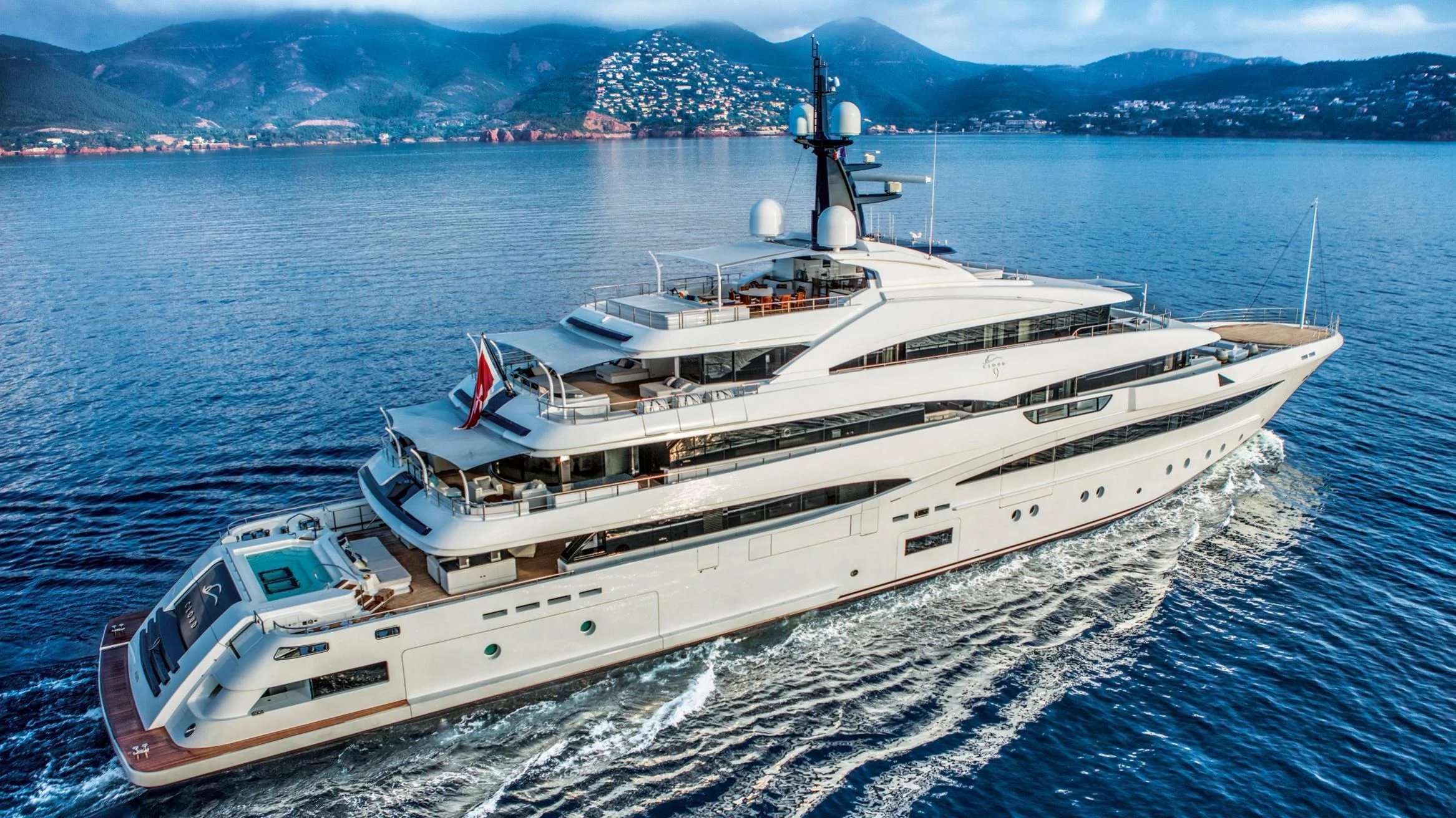 a large ship in the water aboard STARBURST IV Yacht for Charter