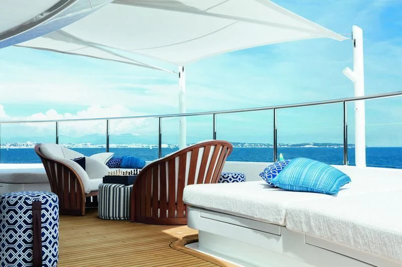a room with a large white tent and chairs aboard STARBURST IV Yacht for Charter