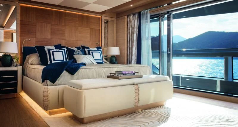 a large bed in a room aboard STARBURST IV Yacht for Charter