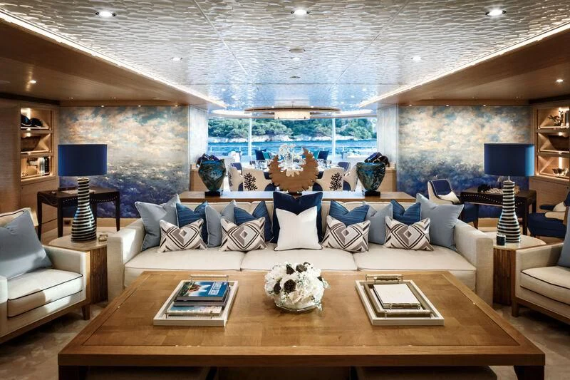 a living room with a large window aboard STARBURST IV Yacht for Charter