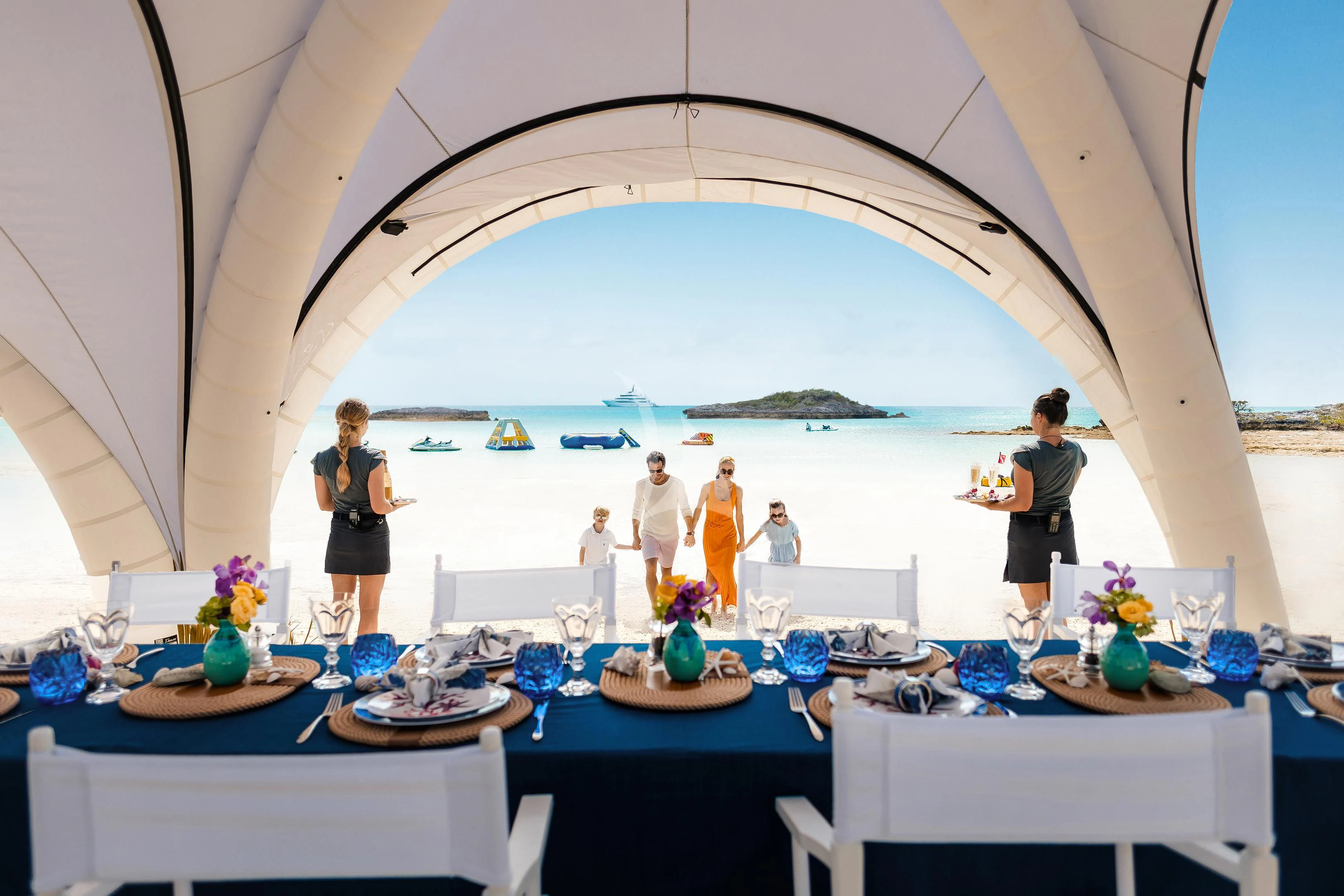 a group of people on a beach aboard STARBURST IV Yacht for Charter